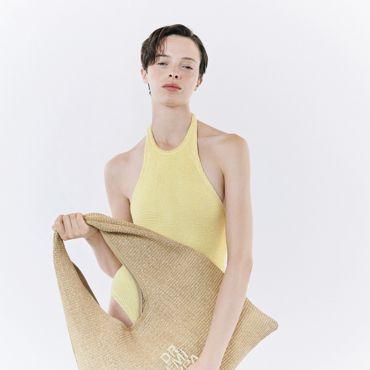 Woman with the DR. EMI summer beach bag