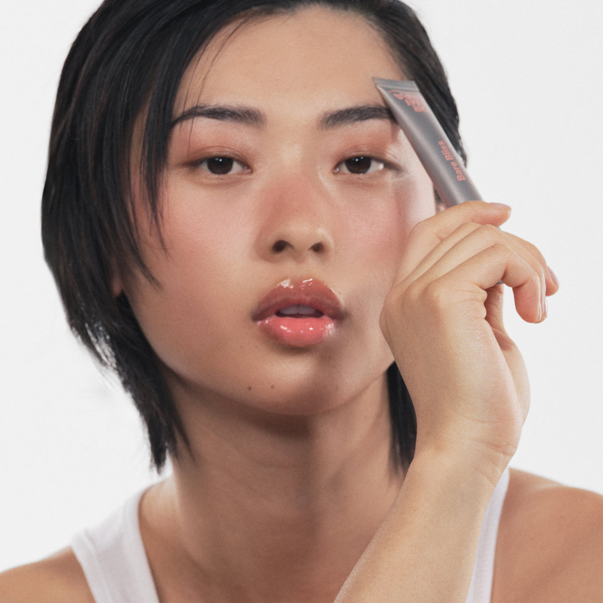 Woman with a Dr. Emi Lip Tint
